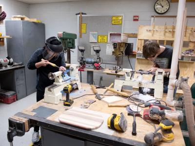 Students turning wood